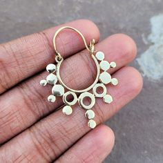 Bohemian Brass Tribal Earrings - Mandala Hoop Earrings - Ethnic Festival Jewelry Material: Brass ( Nickle Free )   Size: 4.5 cm * 3 cm Closure: ear wire Visit Our Shop https://yesindiatreasures.etsy.com USA And UK FREE DELIVERY Gaurantee SHIPPING SERVICE - UPSC Thankyou Mayur Unique Small Hoop Metal Earrings, Small Hoop Earrings For Festival, Bohemian Hoop Cartilage Earrings, Single Hoop Earring For Festivals, Dangle Hoop Earrings For Festival, Dangle Hoop Earrings With Ear Wire For Festival, Nickel Free Hoop Earrings For Festival, Small Metal Hoop Earrings In Bohemian Style, Bohemian Handmade Small Hoop Cartilage Earrings