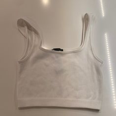 White Rubbed Zara Cropped Tank. Brand New Without Tags! Basic White Ribbed Crop Top, Trendy White Ribbed Crop Top, White Ribbed Crop Top Tank, White Ribbed Crop Top Tank Top, White Ribbed Scoop Neck Crop Top, Fitted Seamless Zara Crop Top, Zara Basic Stretch Crop Top, Trendy Seamless Tops By Zara, Chic White Ribbed Crop Top