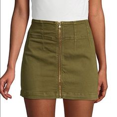 Size 24 Details A Denim Mini Skirt Offers A Refined, Elegant Style Into Any Ensemble. Fit: This Style Runs Large Sizing: 24=00, 25=0, 26=2, 27=4, 28=6, 29=8, 30=10, 31=10-12, 32=12 - Front Zip Closure - Denim Construction - Approx. 15.5" Length (Size 26) - Imported Fiber Content 93% Cotton, 5% Polyester, 2% Elastane Materials 2% Elastane 93% Cotton 5% Polyester Care Machine Wash Casual Mini Bottoms With Zipper Closure, Casual Mini Bottoms With Zipper, Casual Mini Length Bottoms With Zipper, Spring Bottoms With Zip Fly And Mini Length, Trendy Mini Length Bottoms With Zip Fly, Fitted Casual Denim Skirt With Zipper Closure, Casual Summer Skirt With Zipper Closure, Casual Fitted Denim Skirt With Zipper Closure, Casual Denim Skirt With Zipper Closure