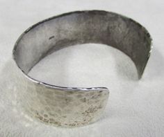 "Hammered sterling silver cuff bracelet. Stamped STER 3/4\" wide. The inside measures 6\" including the 1\" opening. Good condition with natural patina. This bracelet is one you could use everyday. SBT-5" Hammered Sterling Silver, Sterling Silver Cuff Bracelet, Sterling Silver Cuff, Silver Cuff Bracelet, Silver Cuff, Cuff Bracelet, Cuff Bracelets, Silver Bracelet, Sterling Silver