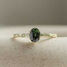 The vintage green sapphire & diamond ring is one of a kind and made in Yellow gold 14K and ready to be shipped after the resizing! Make your proposal special with our shiny oval cut sapphire ring with natural diamonds! Please choose the ring size from the drop down menu. If you would like to order this ring in rose or white gold, please contact me personally. I will be happy to create custom unique engagement ring.✨ Product details: Details of central gemstone: Type: Natural sapphire Carat weigh Green Sapphire Engagement, Green Sapphire Engagement Ring, Green Sapphire Ring, Green Gemstone Ring, Vert Olive, Half Eternity Ring, Sapphire Engagement Ring, Sapphire Diamond Ring, Green Sapphire