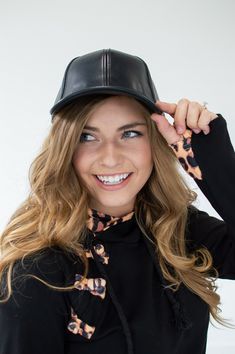 This C.C. leather cap is a standout accessory that tops our best sellers for good reason! The sleek black gives it a fancy feel while the style of the cap allows you to wear it with any outfit. Wear it all year long for a fun pop to any wardrobe. Black Baseball Cap With Curved Visor For Spring, Trendy Black Visor Baseball Cap, Trendy Black Baseball Cap With Visor, Trendy Black Curved Brim Baseball Cap, Trendy Black Baseball Cap, Black Curved Visor Hat For Spring, Black Spring Hat With Curved Visor, Trendy Fall Snapback Baseball Cap, Trendy Winter Hat With Curved Visor