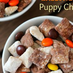 two white bowls filled with halloween puppy chow