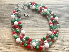 💞One of a kind & ready to ship💞  Great necklace for the holiday season! Various shades of red, green, and white acrylic beads in our signature confetti style :) Approximately 16 inches long plus a 4 inch extender chain.  Matching earrings found HERE: https://www.etsy.com/listing/1343160927/christmas-earrings-red-silver-green-and? *Smoke and pet free home!* I ship 6 days a week! Thank you for browsing my store! December Winter, Christmas Necklace, Necklace Red, Green Jewelry, Jewelry Beaded, Earrings Red, Pretty Bracelets, Holiday Jewelry, White Jewelry