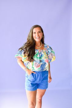 Add a touch of playfulness to your wardrobe with the Yvonne Printed Top. Featuring a unique square neck and puff sleeves, this top is perfect for pairing with denim or shorts. Embrace your fun and quirky side with this must-have piece! Product Details: Measurements: BUST- small 17.5" medium 18" large 18.5" Fabric: 100% Cotton printed elastic square neck slightly cropped puff sleeve model wearing size small model stats: size 4, 5'4 Summer Cotton Puff Sleeve Top With Square Neck, Spring Cotton Puff Sleeve Top With Square Neck, Playful Fitted Tops For Day Out, Spring Vacation Tops With Square Neck, Summer Square Neck Top For Day Out, Cotton Square Neck Top For Vacation, Trendy Cotton Square Neck Top, Square Neck Cotton Tops For Vacation, Blue Square Neck Top For Summer