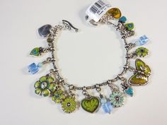 Brighton Vintage item Toggle charm bracelet 7.25" We ship by USPS within 48 hours on Monday – Friday. We ship to the United States only.  We will combine postage if you make a request prior to paying. We are happy to answer questions about our listings and strive for 5-star service for our customers.   Have a great day!  Got Ya Covered Returns not accepted.  Please read descriptions and look at pictures carefully.  See clothing measurements to determine size. Turquoise Metal Charm Bracelet Gift, Turquoise Metal Charm Bracelet As Gift, Green Charm Bracelet As A Gift, Green Charm Bracelet With Lobster Clasp As Gift, Green Metal Charm Bracelet For Gift, Green Metal Charm Bracelet Gift, Adjustable Green Charm Bracelet With Lobster Clasp, Charm Bracelet Aesthetic, Dream Bracelet