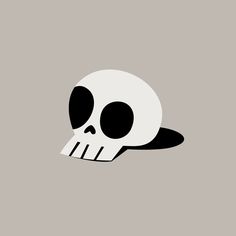 a black and white skull on a gray background