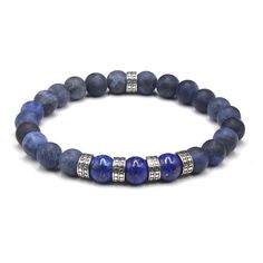 This bracelet features natural 8mm lapis lazuli beads, and 8mm matte sodalite beads accented with five handmade sterling silver hammered "dots" beads. Strung with clear silicon-based stretch cord for extra strength and durability. Select your size from the drop down menu. Add 1/2 inch to your wrist measurement for a comfortable fit. Your bracelet comes in a canvas pouch. Please measure your wrist is you are unsure of the size. Returns are only accepted on customized items if the order is defective or damaged. Sapphire Lapis Lazuli Bracelets With Round Beads, Adjustable Sodalite Beaded Bracelets With 8mm Beads, Sapphire Gemstone Beads Bracelet In Lapis Lazuli, Blue Lapis Lazuli Beaded Bracelets With Polished Beads, Sapphire Lapis Lazuli Beaded Bracelets, Sapphire Lapis Lazuli Beaded Bracelet With Natural Stones, Sapphire Lapis Lazuli Gemstone Beaded Bracelets, Blue Sodalite Beaded Bracelets With 8mm Beads, Blue Lapis Lazuli Bracelets With Polished Beads