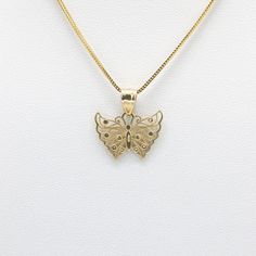 Created in 14k yellow gold, this openwork butterfly pendant is cute and dainty. This pendant is perfect for all the butterfly lovers out there! The chain pictured is for illustration purposes only and may be purchased separately. 14k solid yellow gold 13.9mm tall excluding bail x 19mm wide All measurements are approximate Chain is not included Product color may differ due to lighting 14k Yellow Gold Butterfly Pendant Necklace, 14k Gold Butterfly Charm Pendant Necklace, 14k Gold Butterfly Necklace Pendant, 14k Gold Butterfly Pendant Necklace, Sterling Silver Yellow Gold Butterfly Pendant Necklace, Butterfly Pendant, The Butterfly, Solid Yellow, Gold Necklace