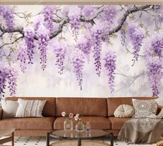 the living room is decorated with purple flowers