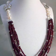 This Necklace Features Strands Of Garnet Beads With Silver Bead Accents. Silver Flowers Transition The Necklace To A Single String Of Freshwater Pearls. In The Back, The Necklace Clasps Easily With A Single Pull Through Hook. 28" Long Shine, Meaning Interior Calm, Is Fine Quality Handmade Italian Jewelry That Was Sold At High-End Boutiques In Italy And Featured On Italian Soap Operas. Purchased In Italy From The Original Jeweler. Matching Earrings Sold Separately. Elegant Sterling Silver Rondelle Beaded Necklaces, Elegant Red Pearl Necklace With Gemstone Beads, Elegant Red Rondelle Beads, Elegant Single Strand Red Pearl Necklace, Elegant Burgundy Jewelry With Faceted Beads, Elegant Red Single Strand Pearl Necklace, Elegant Silver Rondelle Beads, Luxury Red Necklace With Polished Beads, Elegant Sterling Silver Beads