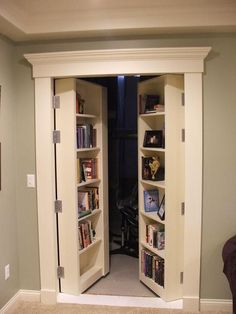 an open book case in the corner of a room