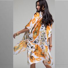 Tangerine Bohemian Design And Floral Print Kimono Duster Beautiful Tangerine Color! Perfect Addition To Your Spring / Summer Wardrobe! Pair With Graphic Or Plain White Tee And Jeans Or Cutoffs! Gauzy Feel! 100% Polyester One Size 34”L X 35”W White Boho Print Kimono For Beach Cover-up, White Kimono With Boho Print, White Flowy Kimono With Kimono Sleeves, White Floral Kimono For Festival, White Floral Print Kimono For Festival, White Flowy Kimono With Floral Print, Printed White Kimono For Festival, White Printed Kimono For Festival, White Boho Print Kimono For Festival