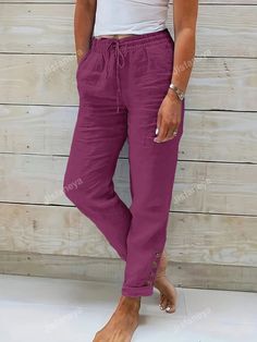 Style:Casual \nClosure Type:Drawstring Waist \nDetails:Pocket \nColor:Violet Purple \nPattern Type:Plain \nType:Straight Leg \nWaist Line:Natural \nLength:Long \nFit Type:Regular Fit \nFabric:Non-Stretch \nMaterial:Polyester \nComposition:100% Polyester \nCare Instructions:Machine wash, do not dry clean \nPockets:Yes \nTemperature:Spring/Fall (18-25℃/63-77℉) \nBody:Unlined \nSheer:No \n Button Decorations, Violet Purple, Women Pants, Tapered Pants, Drawstring Waist, Style Casual, Elastic Waist, Straight Leg, Pants For Women