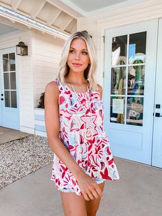 This tank is stunning! That abstract floral print is so fun and bold! It's going to look amazing with white jeans, shorts, or skirts! This babydoll tank is perfect for you and the warm summer weather! Red Summer Tank Top For Beach Season, Red Tank Top For Spring Vacation, Summer Tank Top For Day Out, Summer Printed Tank Top, Red Tank Top For Vacation, Red Sleeveless Tank Top For Vacation, Red Sleeveless Tank Top For Summer, Red Tank Top For Beach, Red Tank Top For Spring And Summer