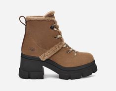 We are living for the elevated confidence of the Brooklyn Hiker. Our Plush Seam and hiker-inspired laces complement water-resistant suede to serve fresh-from-the-mountains realness. Lined with UGG®plush, breathable textile, and soft microfiber. With a chunky 3 inch platform and 2 inch heel, you'll be cruising at a new altitude this season. | Protected: Waterproof or Water-Resistant Materials. Water-resistant suede. Sheepskin spill seams. 10mm UGG®plush 60% upcycled wool, 40% TENCEL Lyocell shaft