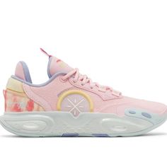 a pink and yellow sneaker with floral print on the upper part of the shoe