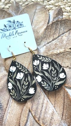 This listing is for one pair of handpainted wood earrings with nickel free gold color hardware. All designs are completely created by Michele Norman. Main color: Black Earring length (not including hardware): 2" Black Earring, Hand Painted Earrings, Painted Earrings, Hand Painted Wood, Wooden Hand, Black Earrings, Wood Earrings, Woodstock, Main Colors