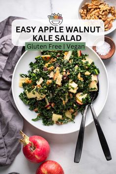 an apple walnut kale salad in a white bowl