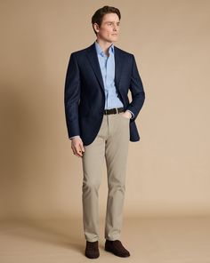 100% wool, Woolmark certified, Available in classic and slim fit, Straight flap pockets with chest pocket, Single breasted two-button fastening, Four-button non working cuff with natural sustainable buttons, Canvas chest piece construction, Back panel lining: 100% Polyester, Front panel lining: 100% polyester in exclusive Charles Tyrwhitt lapwing design, Dry clean only - Proper Blazer - Steel Blue - Proper Blazer - Steel Blue | Men's Charles Tyrwhitt Proper Blazer - Steel Blue Size 36R Wool Male Business Attire, Men’s Business Fashion, Business Professional Men, Men Business Attire, Business Professional Outfits Men, Dress Code For Men, Blazer Men Outfit, Blue Blazer Outfit Men, Business Casual Male