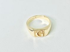 On display is a gold monogram ring available in 10K, 14K. Customizable embossed or laser inscription -  just message for specifics (font, symbols etc) 14k Gold Engraved Ring With Initials For Collectors, Personalized Engraved Yellow Gold Ring For Collectors, Classic Gold Initial Ring Collectible, Gold Engraved Initial Ring, Gold Engraved Initial Ring Collectible, Personalized Yellow Gold Signet Ring Collectible, Collectible Yellow Gold Signet Ring With Initials, 14k Yellow Gold Signet Ring With Initials, Antique Personalized Yellow Gold Signet Ring