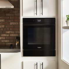 an oven built into the wall in a kitchen