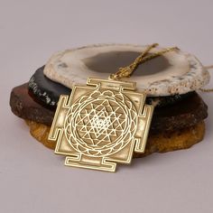 14K Gold Handmade Sri Yantra Necklace - Spiritual Gold Necklace, It can be considered a spiritual gift. Pendant Details 💎 Gold KT: 14K Solid Gold or 8K Solid Gold 💎Gold Color Options: Yellow Gold, White Gold, Rose Gold 💎Thickness: 0.80 mm ✈️ Ready to Ship in 4-7 Business Days ✈️ Transportation is provided by express cargo MORE OF US Pendants and Necklaces: https://goldencastlejewelry.etsy.com NECESSARY INFORMATION 🧡 We provide workshop service in Ankara, we are happy to share our knowledge a Luxury Ceremonial Temple Necklace Pendant, Spiritual Jewelry Locket For Blessing, Spiritual Locket Jewelry For Blessing, Brass Necklace As Diwali Gift, Spiritual Jewelry With Large Pendant, Gold Temple Jewelry Necklaces As Gift, Spiritual Round Pendant Necklaces For Rituals, Brass Necklace For Diwali Gift, Spiritual Medallion Jewelry