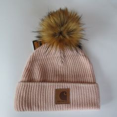 Custom Hat: Carhartt Cherry Blossom Beanie Altered With The Addition Of A Handmade In The Usa Premium Lynx Faux Fur Pom We Make By Hand All Of Our Poms Here In The Us Listing Crossposted On Ebay 100% Acrylic Rib-Knit Partial Fleece Lining For Warmth Cardigan Stitch Pattern Leatherette Carhartt Patch Sewn On Front Pink Casual Beanie Cap, Pink Cap For Fall, Winter Pink Cap, Trendy Adjustable Pink Beanie, Trendy Pink Beanie, Casual Pink Beanie, Pink Winter Cap, Pink Beanie Cap (one Size), Casual Pink Beanie One Size