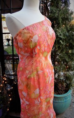 "Vtg 1960's Orange Pink Green Floral Grecian Style Full Length Nylon Dress & Scarf sz S/6 This is a lovely vintage dress I picked up recently in New England. It's a bright sheer nylon fabric in orange, pink, and green. It is a Grecian off the shoulder style. This dress is fully lined. The bottom of the dress has beautiful triangular inserts. There is a back zipper here as well. I believe this dress is hand made and it is nicely done. There is a beautiful scarf that goes along with the dress Vintage Orange Mini Dress For Spring, Spring Retro Vintage Dress For Cocktail, Spring Retro Vintage Cocktail Dress, Retro Summer Vintage Dress For Cocktail, Retro Vintage Dress For Summer Cocktail, Retro Fitted Mini Dress For Garden Party, Spring Retro Cocktail Vintage Dress, Fitted Retro Mini Dress For Garden Party, Mid-century Summer Party Dresses