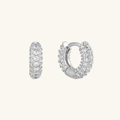 Stunning cz pave huggie earrings made for statement or layering with all your favorite earrings! These gold hoop earrings are made of gold plated 18k gold plated brass and include cubic zirconia throughout. Great for everyday wear and for any occasion. - Made in 18k gold plating- Hoop diameter: 6.5 mm.- Hoop thickness: 3.5 mm. Cubic Zirconia Huggie Earrings With Sparkling Stones, Sparkling Cubic Zirconia Huggie Earrings, Diamond Huggie Earrings With Sparkling Stones, Sparkling Huggie Hoop Earrings In Cubic Zirconia, Everyday Huggie Earrings With Sparkling Stones, Everyday Pave Setting Huggie Hoop Earrings, Silver Plated Jewelry, Huggie Earrings, Gold Hoops