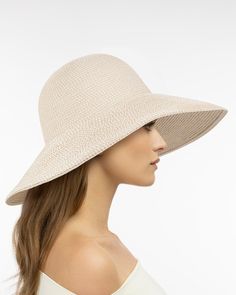 Made from partially recycled materials, our patented Squishee® straw has a classic look you will love. This sustainable product of man-made materials looks and feels like authentic raffia straw and is more durable than a hat made of natural fiber. If you have been searching for a woman's designer packable hat for sale, this is a style you will use for many years to come. Bella rolls and folds into a tote bag for travel and will emerge wrinkle-free when unpacked. Eric Javits' Squishee® hats are k Small Leather Accessories, Hat Fabric, Packable Hat, Hat Blocks, Art Costume, Gold Sand, Women's Headwear, Navy Linen, Natural Gold