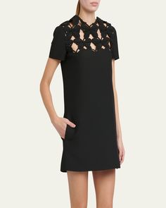 Valentino Garavani mini dress features butterfly cutout details at the neckline     Round neckline     Short sleeves    Hem falls above the knee    Aline silhouette    Back zip closure     Virgin wool/silk    Made in Italy Elegant A-line Dress With Cutout, Designer Mini Evening Dresses, Cutout Knee-length Evening Dress, Knee-length Cutout Evening Dress, Evening Knee-length Cutout Dress, Designer Mini Dress For Evening, Elegant Cutout Short Sleeve Dress, Formal Cutout Mini Dress, Elegant A-line Dress With Cutout Details