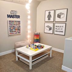 a living room filled with furniture and toys on display in front of a lego poster