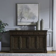 a living room scene with focus on the sideboard