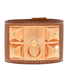 This is an authentic HERMES Swift Collier De Chien CDC Bracelet size S in Gold. This chic dog collar bracelet is crafted of swift calfskin leather in brown and features a polished rose gold studded panel with a ring and a studded clasp. Luxury Rose Gold Bracelets, Luxury Leather Bracelet With Gold-tone Hardware For Formal Events, Luxury Leather Bracelet With Gold-tone Hardware For Formal Occasions, Elegant Leather Bracelet With Gold-tone Hardware, Elegant Leather Bracelet With Gold-tone Hardware For Formal Occasions, Formal Gold Leather Bracelet With Gold-tone Hardware, Modern Gold Leather Bracelet With Gold-tone Hardware, Luxury Leather Bracelet With Gold-tone Hardware, Elegant Leather Bracelets With Gold-tone Hardware