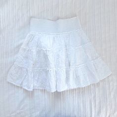 American Eagle White Eyelet Tiered Ruffle Mini Skirt Smocked Waistband, Stretchy Size Xs Never Worn, Tag Has Been Ripped Off But Plastic Thing Is Still There It Is Brand New Is Lined Underneath, But No Shorts It Is A Skirt So Cute For Summer / Bridal Things Bridal Things, Skirt Flowy, Skirts Flowy, Ruffle Mini Skirt, White Eyelet, White Skirts, Smocking, American Eagle Outfitters, Mini Skirt