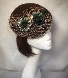 Brown chocolate vintage style button base fascinator.  With the current vintage trends, the fascinators are a current headdress option for that special occasion ideal for the retro chicness of up to date fashion directions.  The base measures approx  10" diameter and is hand blocked from a high grade felt. This design features a cluster of Aluminium flowers teamed with a gather of soft veiling.  Each of our fascinators are lined with a black petersham band and has a hat elastic attached enabling Brown Beret, Gold Fascinator, 1940s Hats, Wedding Headdress, Hat Wedding, Gold Hats, Flower Hat, Vintage Trends, Wedding Hat