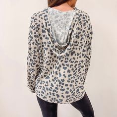 - 78% Polyester, 18% Rayon, 4% Spandex - Pocket in the front - True to size - Slightly oversized fit - Model is pictured in a size small Leopard Silhouette, Drop Shoulder Hoodie, Olivia Mark, Shoulder Sleeve, Drop Shoulder, Pullover Hoodie, Leopard Print, Fitness Models, Types Of Sleeves