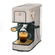 an espresso machine with a cup of coffee