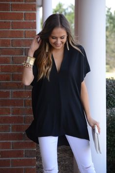 $69.00 This tunic is too dreamy to pass up. No really. It's that good. The fit is half way between flowing and boxy, so it looks great tucked in or worn loosely. Top features a v-neckline and hi-low hemline for a flowing fit. *also available in blue Versatile V-neck Blouse For Beach, Elegant V-neck Tunic For Fall, Elegant Fall V-neck Tunic, Chic V-neck Tunic For Spring, Versatile Oversized V-neck Blouse, Oversized Versatile V-neck Blouse, Chic Flowy Blouse With Split Neck, Chic Flowy Split Neck Blouse, Chic V-neck Blouse For Layering