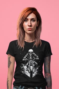 Skeleton Motorcycle, Rider T-shirt, Skeleton Biker Tee, Halloween Biker Tee, Ghost Rider Shirt, Spooky Biker Tshirt, Motorcycle Shirt, Biker Gift, Shirts For Women, Shirts for Men, Skeleton Rider Shirt, Scary Rider, Halloween Shirt, Motorcycle T-shirt, Get ready to ride into the night with our Skeleton Motorcycle Rider T-Shirt. Perfect for Halloween or any occasion where you want to add a touch of spooky/edgy style to your look. There are no side seams. The collar is made with ribbed knitting to prevent curling damage. All shirts feature a tear-away label for total wearing comfort. Made using ethically grown and harvested US cotton.   See Size Chart in Pictures.  Products are unisex and relaxed fit. You may consider a down size for a more feminine look. Please double check size charts avai Edgy Skull Print Short Sleeve Top, Edgy Short Sleeve Top With Skull Print, Edgy Skull Print Crew Neck T-shirt, Edgy Crew Neck T-shirt For Biker Events, Grunge Crew Neck Tops For Biker Events, Edgy Cotton Tops For Biker Events, Biker Skull Print Crew Neck Top, Biker Crew Neck Tops With Skull Print, Punk Style Crew Neck T-shirt For Biker Events