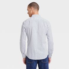 Update your wardrobe for smart-casual occasions with this Every Wear Long-Sleeve Button-Down Shirt from Goodfellow & Co™. This printed long-sleeve shirt made from soft cotton material with added stretch offers cool and comfortable all-day wear. Fashioned in a slim fit, it features a collared neckline, button-down front and chest patch pocket for classic style, while the below-waist design allows you to wear it either tucked in or untucked. Wear it with chinos, jeans or trousers for versatile sty Large Clothes, Update Your Wardrobe, Big Men, Smart Casual, Tshirt Colors, Cool Shirts, Patch Pocket, Cotton Material, Sleeve Styles