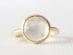 Hey, I found this really awesome Etsy listing at https://www.etsy.com/listing/560239142/rose-cut-round-moonstone-bezel-ring 14k Gold Solitaire Moonstone Ring, Minimalist Round Cabochon Opal Ring, Minimalist Opal Ring With Bezel Setting, 14k Gold Moonstone Gemstone Ring, White Moonstone Ring With Bezel Setting In 14k Gold, Yellow Gold Opal Ring With Rose Cut Diamonds, Yellow Gold Moonstone Ring With Birthstone, White Moonstone Ring With Bezel Setting, Yellow Gold Moonstone Birthstone Ring