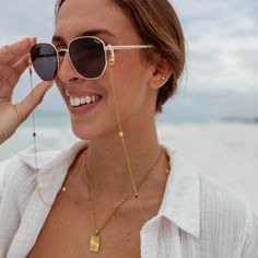 LAST CHANCE - THIS ITEM WILL NOT BE RESTOCKEDWear on your sunglasses or AirPods to keep them safe and stylish! 18K Gold-Plated Stainless Steel Nickel-Free Lead-Free Hypoallergenic Lobster Clasp 34" Chain Adjustable Sunglass Chain Loop Water Resistant Trendy Summer Glasses Chains With Chain Strap, Adjustable Chain Strap Glasses Chains, Everyday Gold Glass Jewelry, Gold Glass Necklace With Adjustable Chain, Chic Gold Sunglasses For Everyday, Chic Everyday Gold Sunglasses, Adjustable Gold Glasses Chain With Strap, Modern Metal Glasses Chains With Adjustable Chain, Gold Sunglasses With Uv Protection For Travel