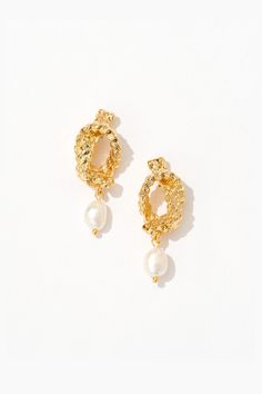 Pearls that drop with timeless elegance. Chic Pearl Drop Clip-on Earrings For Formal Occasions, Chic Formal Pearl Drop Clip-on Earrings, Chic Formal Clip-on Pearl Drop Earrings, Chic Pierced Pearl Drop Earrings, Chic Drop Pearl Earrings, Elegant Clip-on Hoop Earrings, Chic Dangle Hoop Earrings For Formal Occasions, Gold Pearl Earrings, Pearl Gemstone