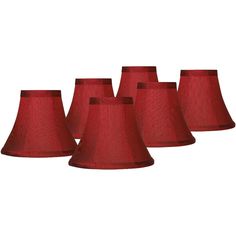 six red lampshades lined up in a row