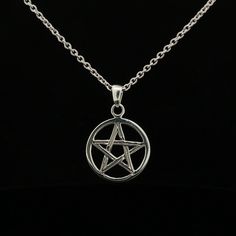 Elevate your spiritual style with our Sterling Silver Pentagram amulet. This simple yet striking pagan jewelry pendant is a minimalist expression of Wicca, perfect for women and girls seeking understated elegance. Each pendant is made-to-order, and we kindly ask for your patience as our dedicated team invests love and effort into casting your unique piece. Please anticipate a production time of 5-14 days for completion. Your wait will be rewarded with a truly special and meaningful accessory. *STERLING SILVER CHAIN NOT INCLUDED. PENDANT ONLY.* -- LXW: 19mm x 19mm -- Material: 925 Sterling Silver -- Finish: Polished -- Packaging: Cleaning cloth and jewelry bag -- Designed and Handmade in Thailand (Please expect slight variations in product as each piece is individually handmade.) CARE INSTR Spiritual Style, Wicca Jewelry, Pentagram Necklace, Pagan Jewelry, Tarnished Silver, Rose Gold Pendant, Necklace Simple, Necklace Minimalist, Understated Elegance