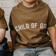 This 100% cotton Child of God Toddler Tee is perfect for encouraging your little one to embrace their faith. It is comfortable and stylish Made with soft, breathable fabric to ensure they stay comfortable all day long A great addition to any wardrobe! Made in the USA, ships from Milton, GA Affirmation Words, Hoodie Ideas, Trendy Hoodies, Child Of God, Christian Apparel, Long A, Children In Need, Toddler Tees, Christian Clothing