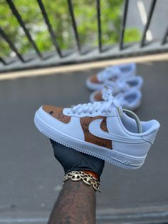 Welcome to Kiauns Customs LLC, your premier destination for personalized footwear that transcends ordinary style. Elevate your shoe game with our exquisite collection of customized sneakers, carefully curated for those who appreciate the extraordinary. Custom Mcm AF1s . This price includes purchasing the sneakers. All Adult sizes are for both Men and Women. All prices are USD. Color Shade of shoe may vary on screen versus in person and under different lighting. All shoes are Made to Order and turnaround for completion is 4-6 weeks per shoe. Why Choose Kiauns Customs LLC:1. Customized Elegance:Indulge in the luxury of bespoke fashion with our custom sneakers. Each pair is a masterpiece, meticulously designed and handcrafted to embody your unique style. Our customization options allow you to Customizable Leather Sneakers, Custom Leather Sneakers, Customized Sneakers, Air Force One Shoes, Custom Nike Air Force, Custom Nike Air, Nike Air Force 1s, Air Force 1s, White Shoe