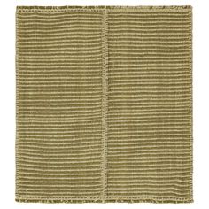 a green rug with vertical stripes on the bottom, and two rows of horizontal lines in the middle